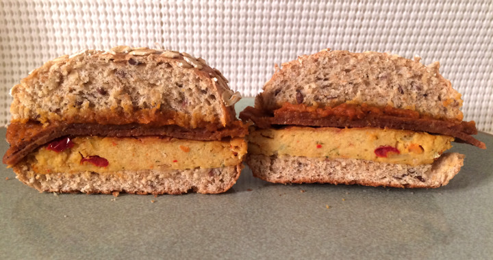 Sweet Earth Harmless Ham, Vegan Chickpea Patty, and Sun-Dried Tomato Farmstand Breakfast Sandwich
